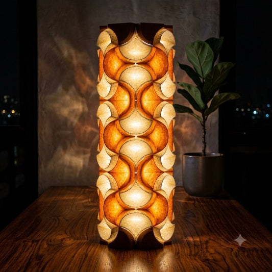 Terra Crescent tower lamp lit at night